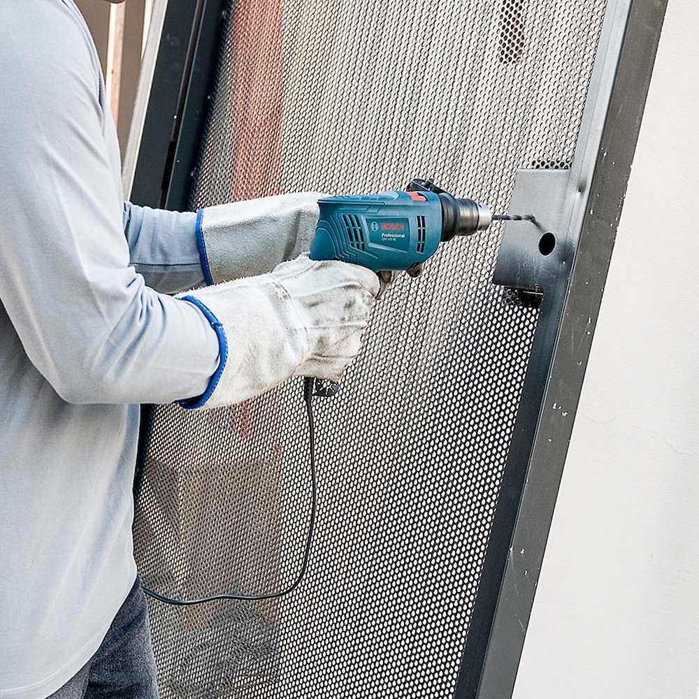 Furadeira de Impacto  Bosch 1/2 GSB550 VVR + 34 Acessórios 550W 110V