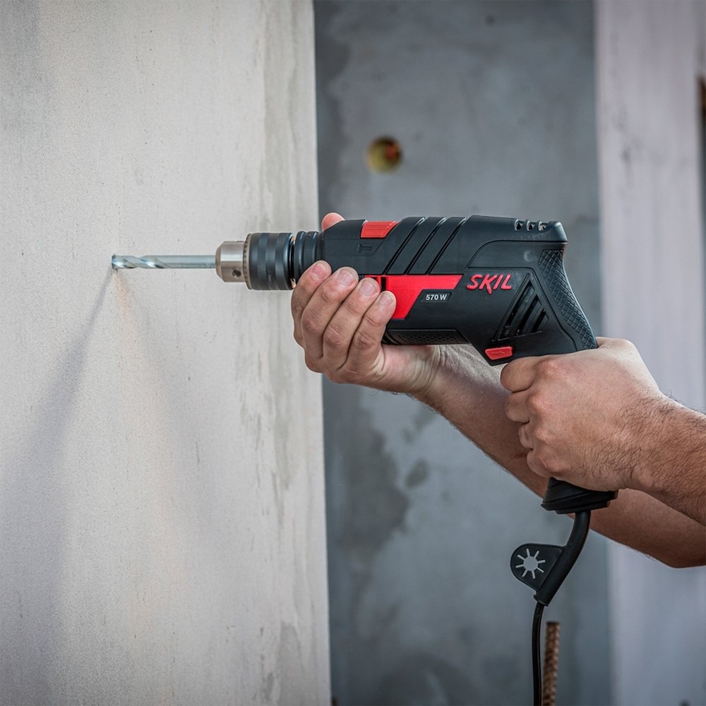 Furadeira de Impacto Skil 1/2 6555 570W VVR + 10 Acessórios com Maleta 220V