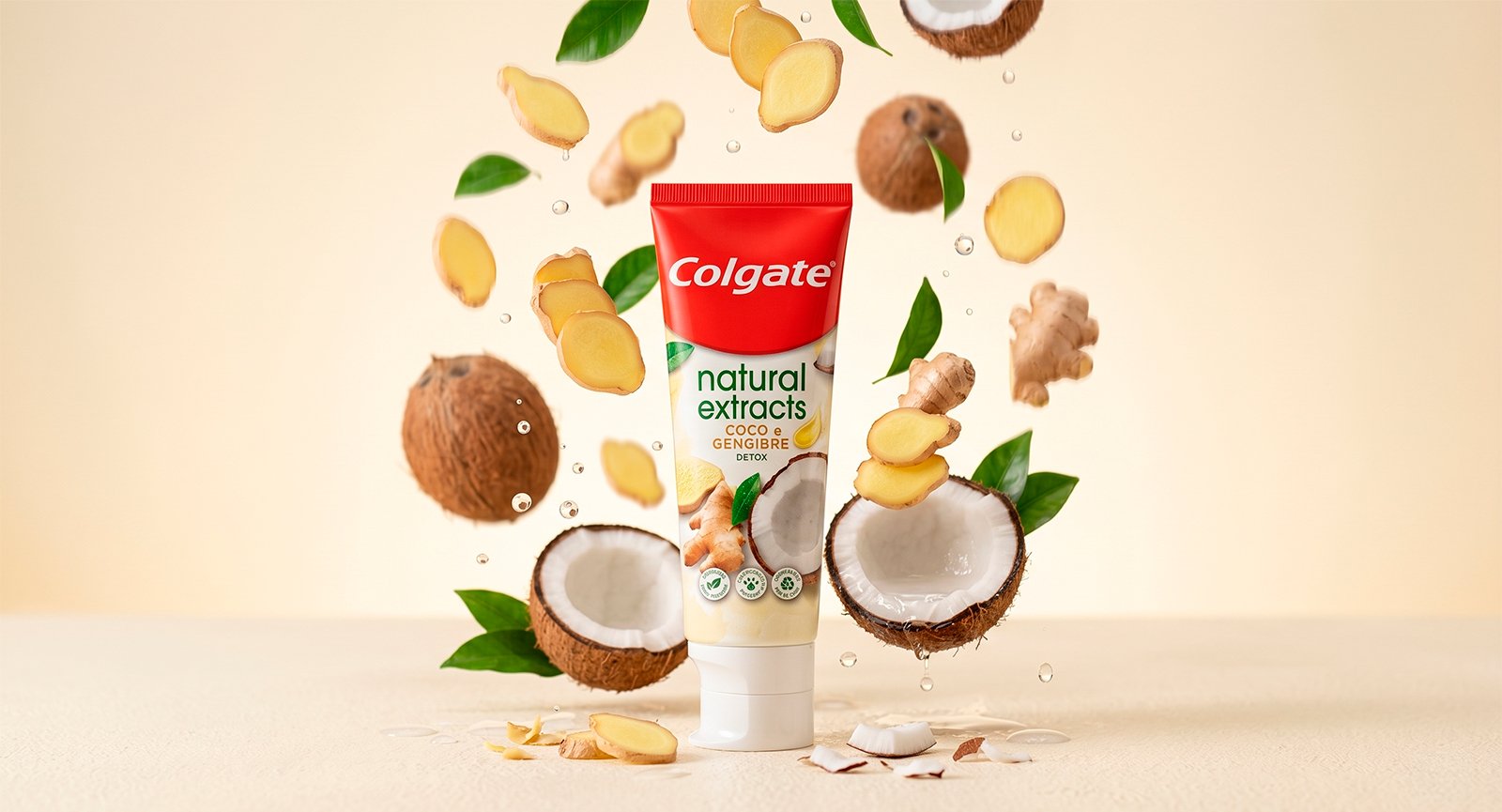 Creme Dental Colgate Natural Extracts Detox 90g com cocos e fatias de gengibre flutuantes