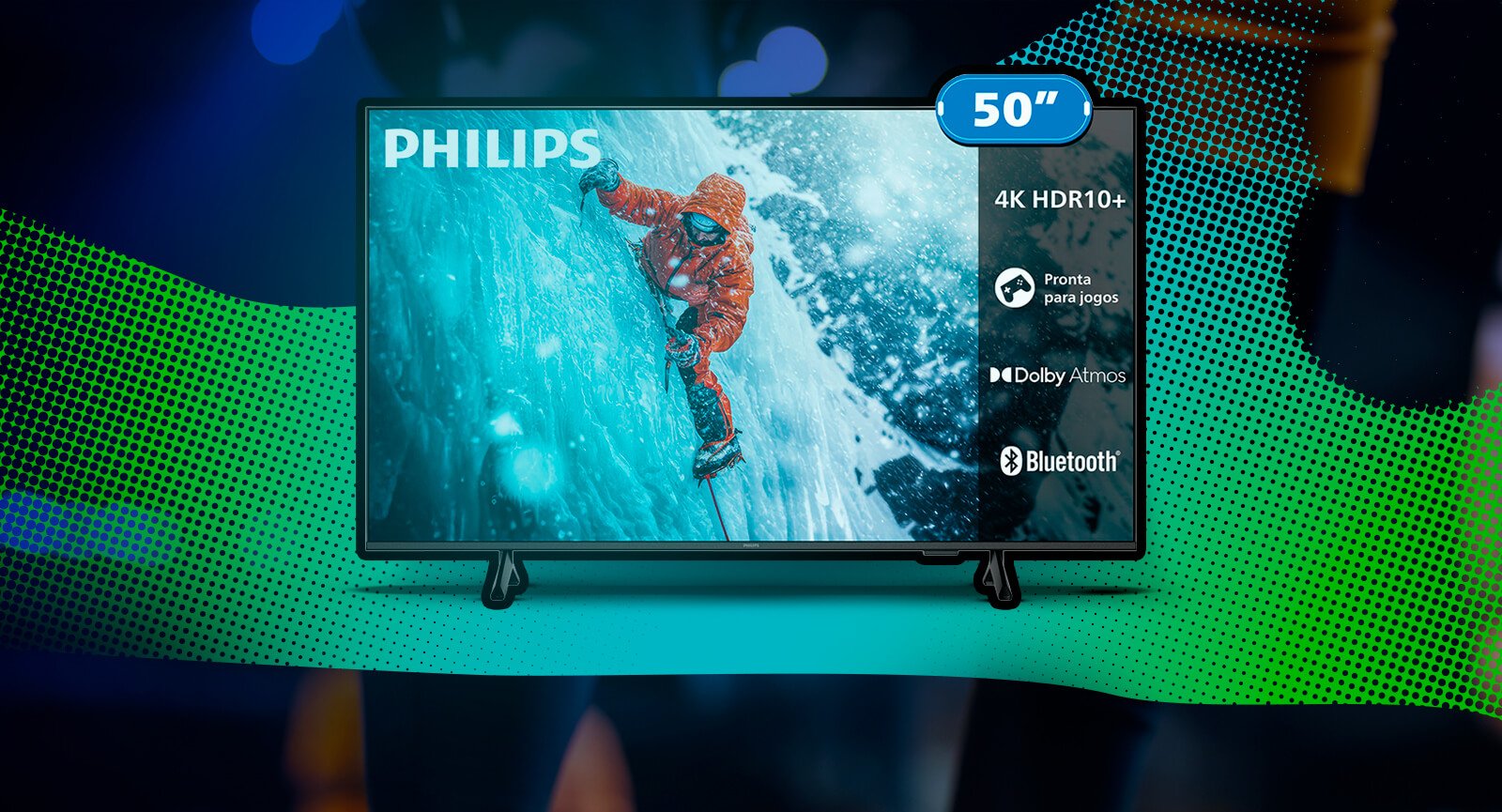 Smart TV Philips 50 4K exibindo alpinista e ícones HDR10+, Dolby Atmos, Bluetooth e jogo